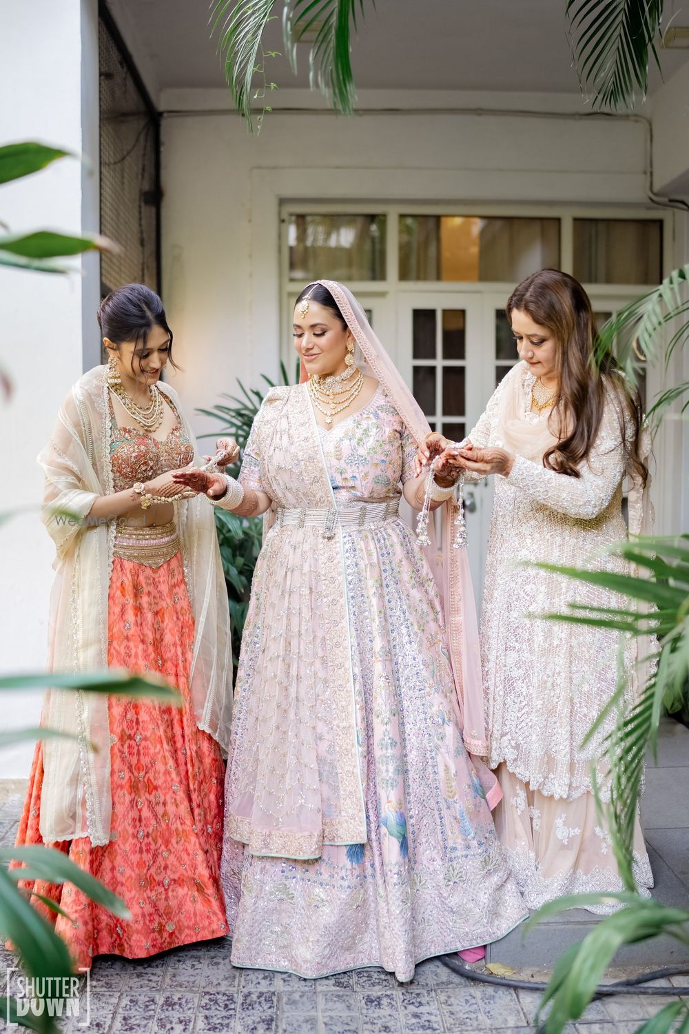 Photo of Pretty bride & bridesmaid shot