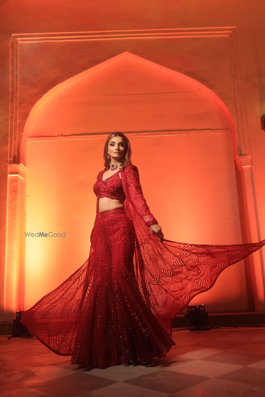 Photo of Blood red indo-western cape outfit in red with a crop top and flared pants