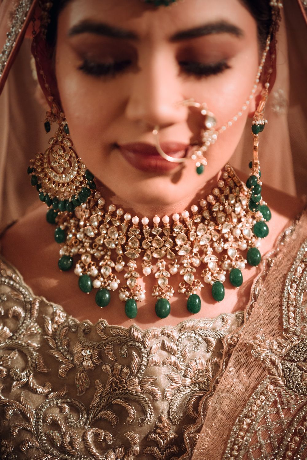 Photo of Contrasting bridal jewellery with green beads