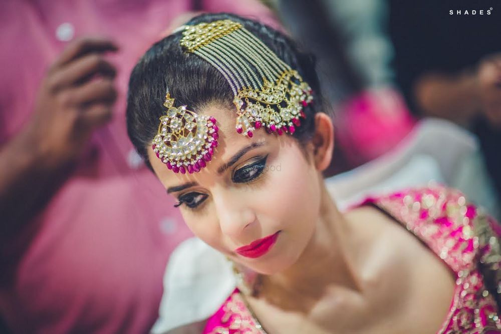 Photo of Hot Pink Bridal Jewelry and Makeup
