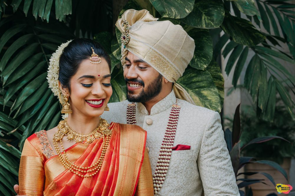 Photo of Bright and happy couple shot with both in contrasting outfits