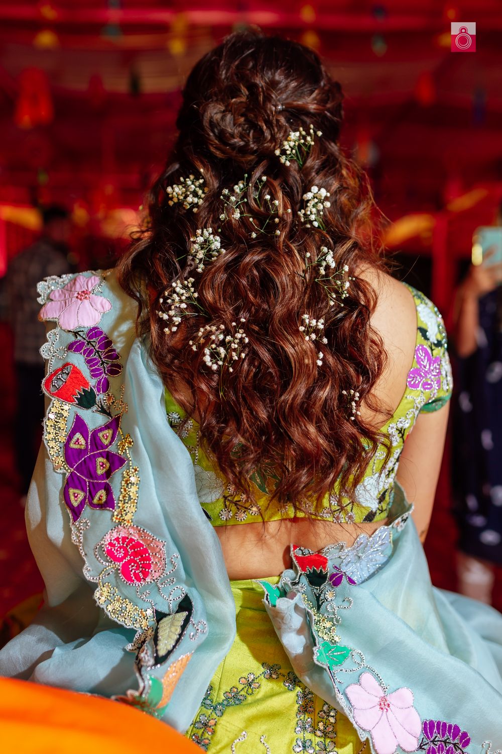 Photo of bridal hairdo with babys breath
