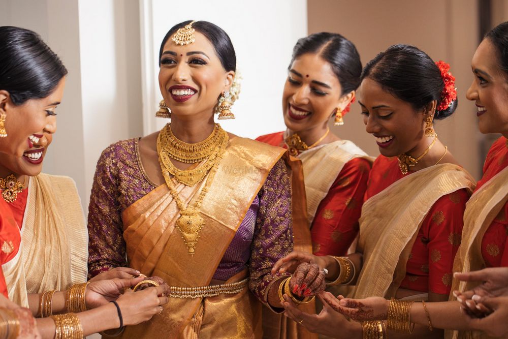 Photo of bridal getting ready shot with bridesmaids