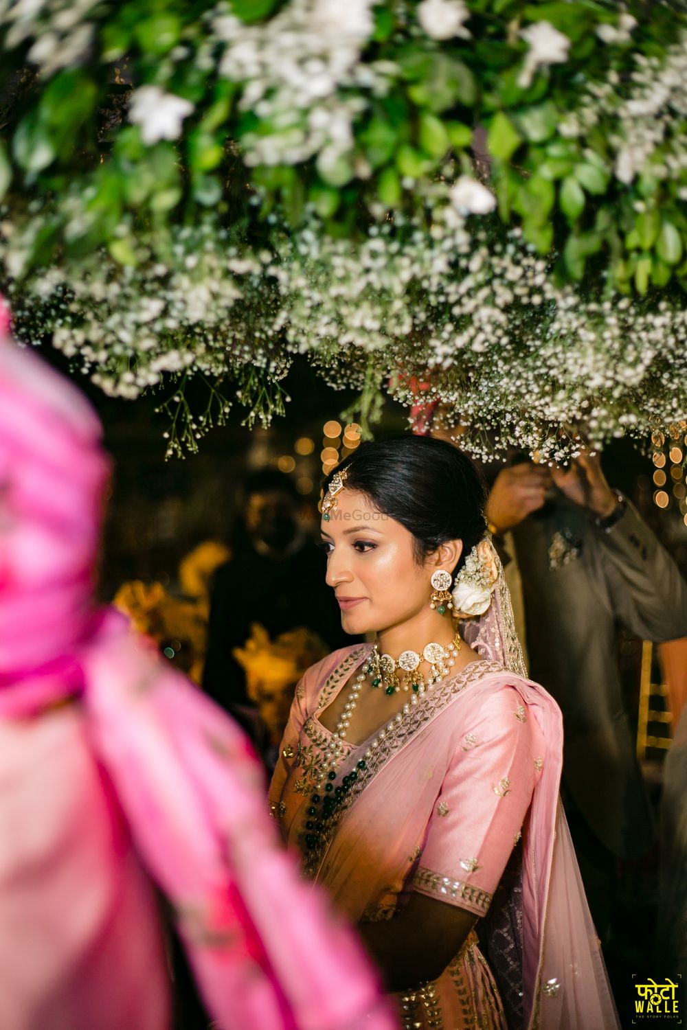 Photo of bride under phoolon ki chadar