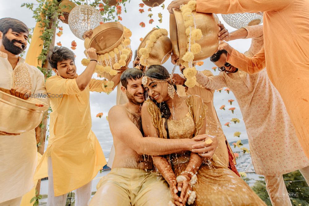 Photo of fun haldi couple portrait