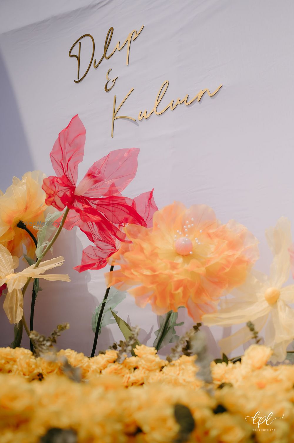 Photo of Statement yet delicate organza flower decor element for the haldi ceremony