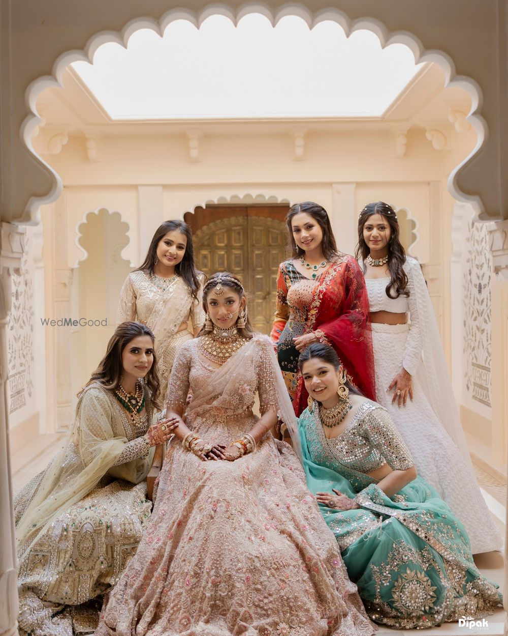 Photo of Lovely shot of the bride and her bridesmaid on the wedding day