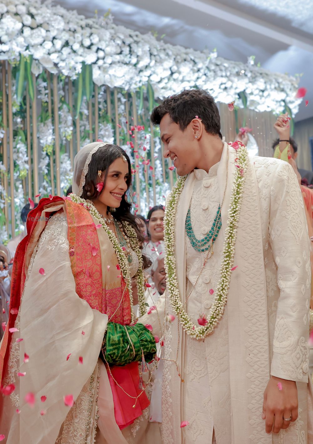 Photo of Cute portrait of the couple during pheras with matching mogra bud jaimalas