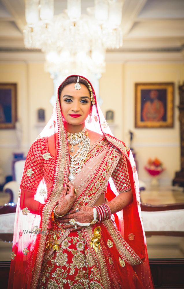 Photo of Red bridal lehenga with blush pink dupatta