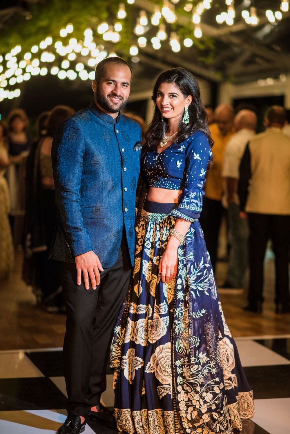 Photo of Dark blue and gold lehenga for sangeet or cocktail