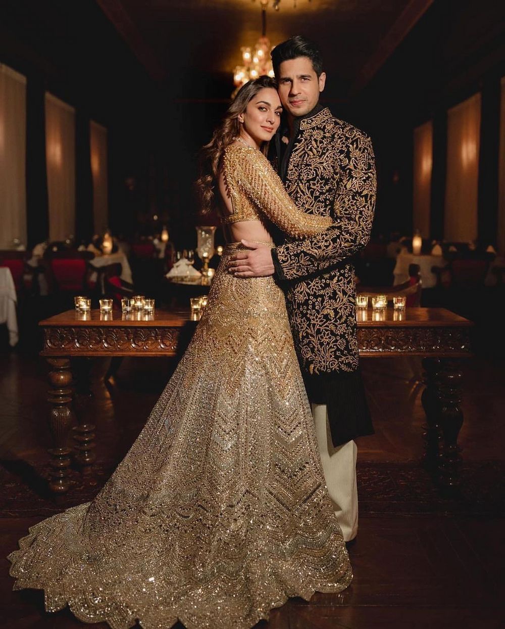 Photo of kiara siddharth wedding sangeet photo with both in manish malhotra outfits