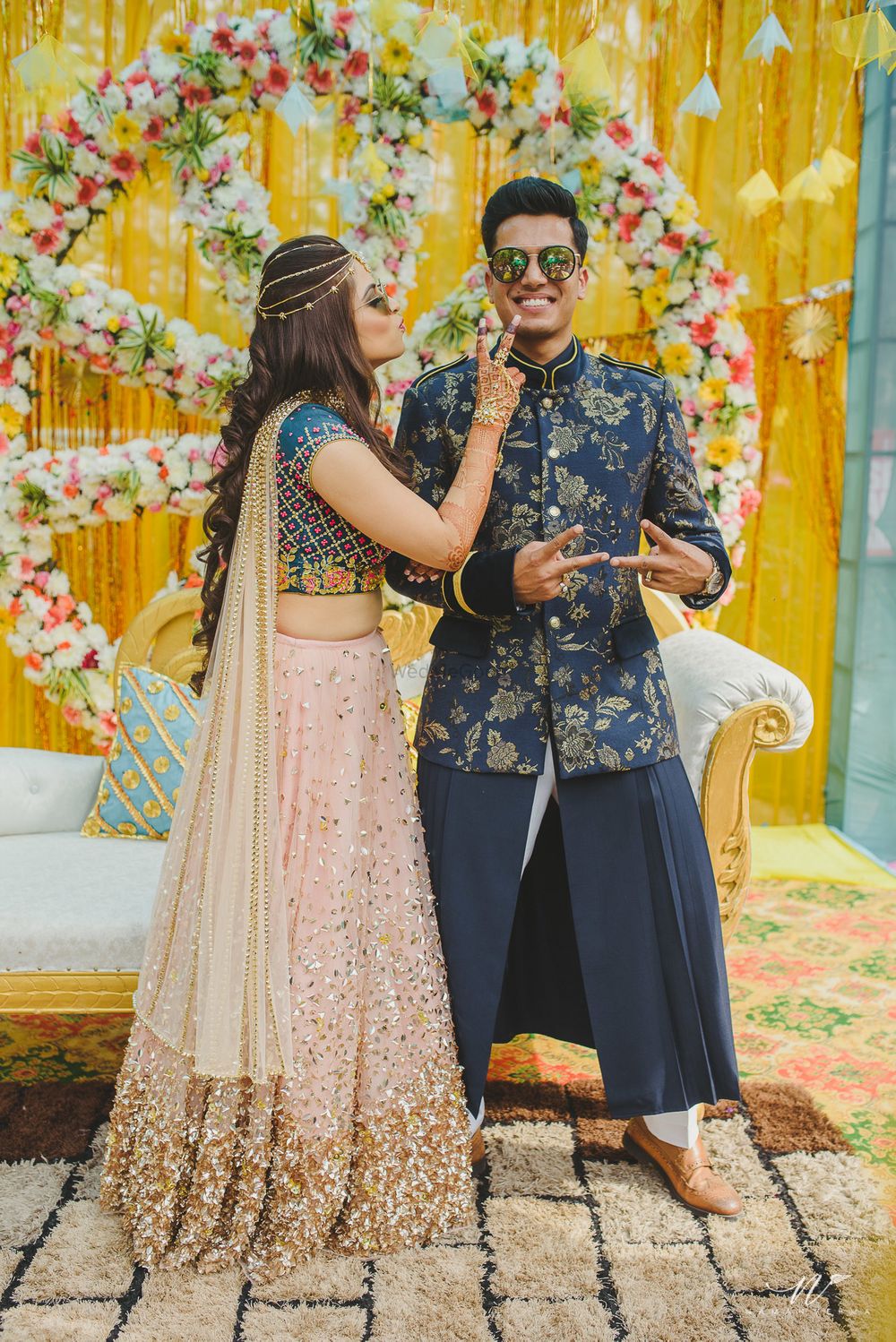 Photo of Unique groomwear outfit with floral bandhgala