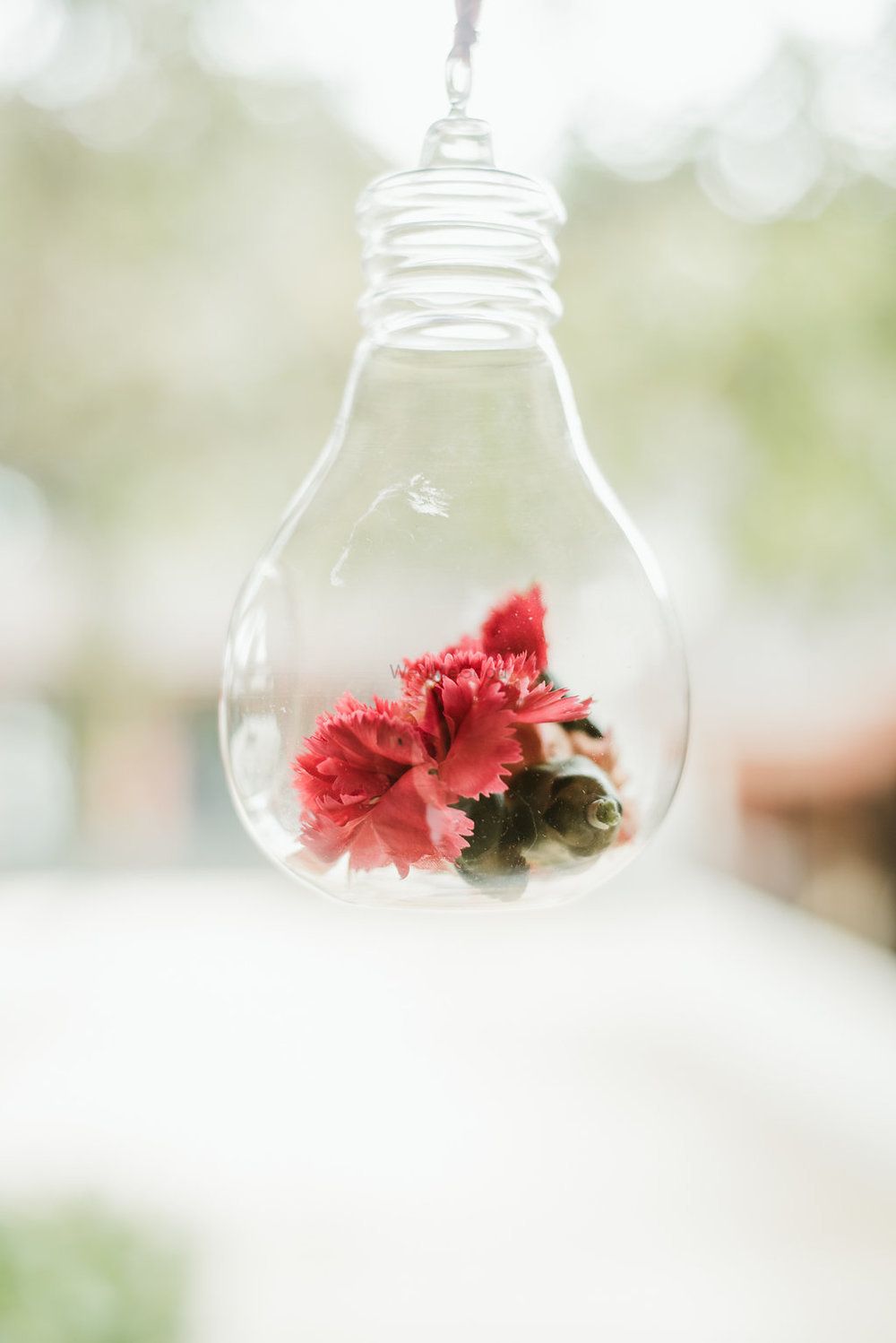Photo of DIY decor idea with florals inside bulbs