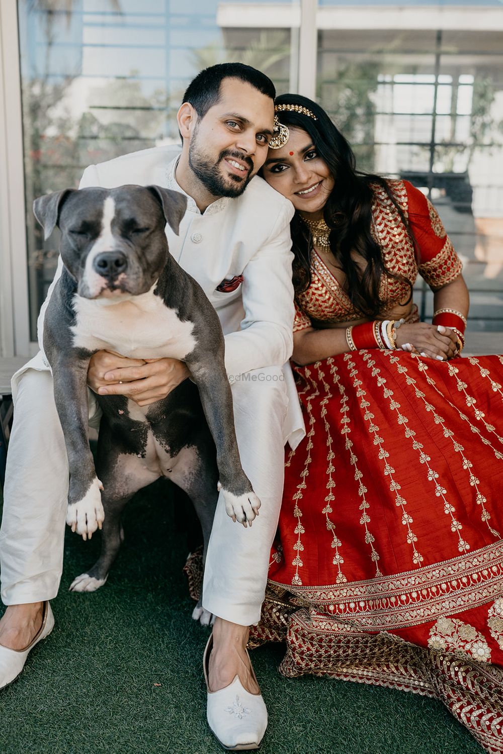 Photo of Couple shot with their dog