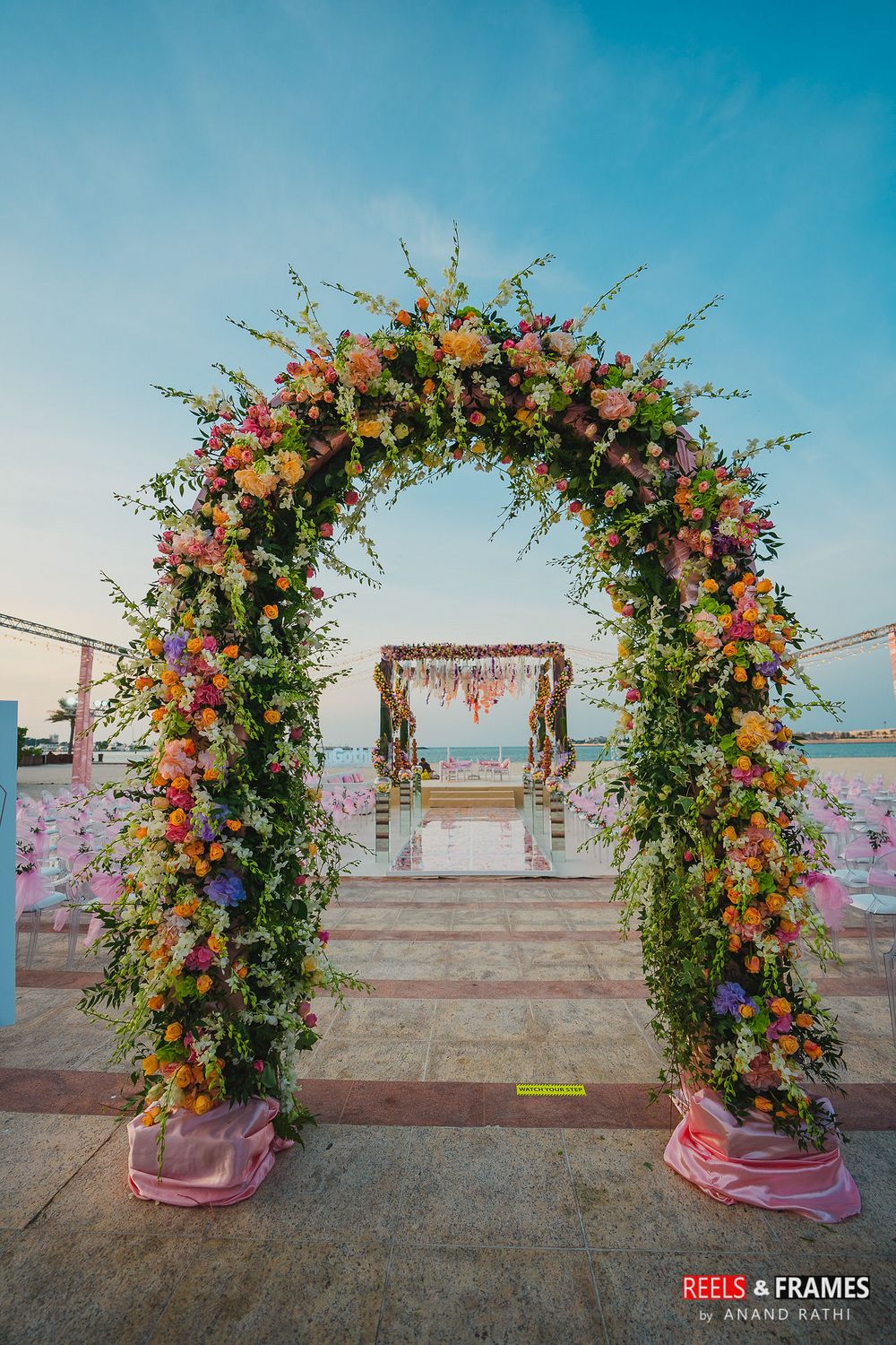 Photo of A floral archway decor with fresh flowers for a day wedding