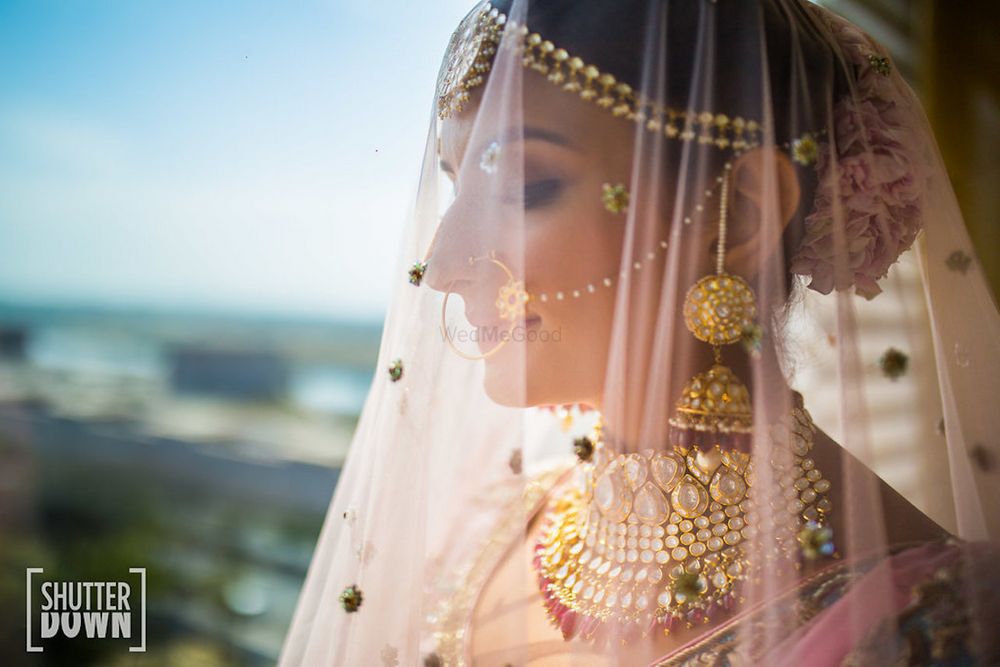 Photo of Bridal portrait idea with dupatta as veil