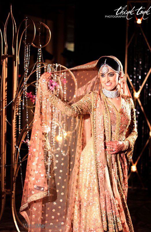 Photo of Peach sabyasachi  stunning jacket style leheng