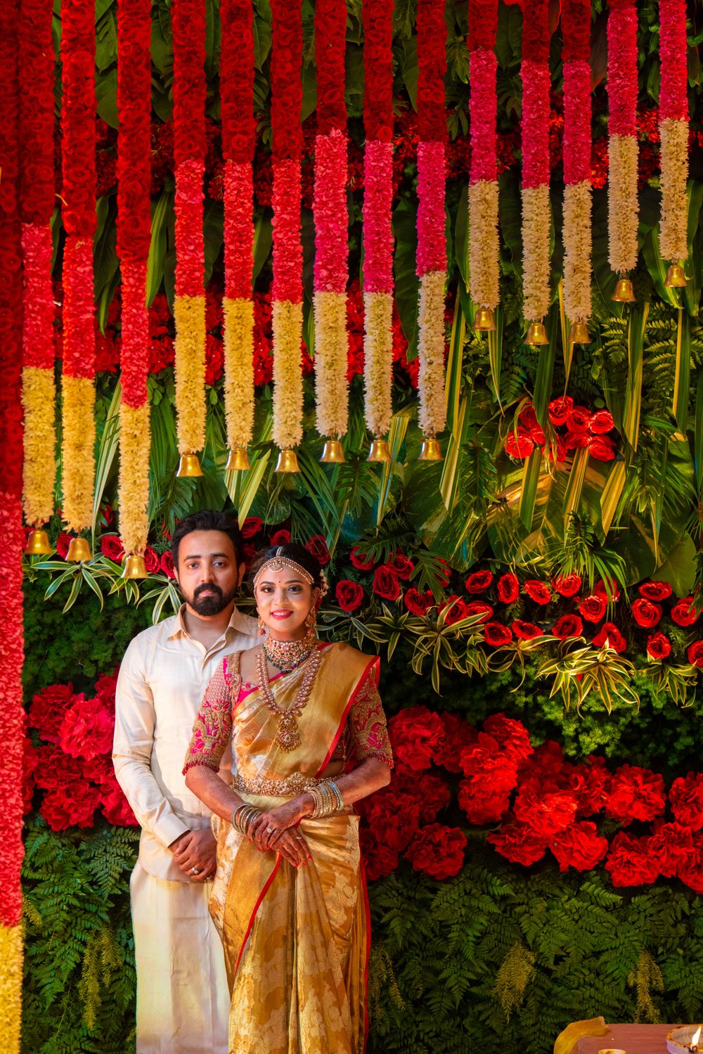 Photo of South indian couple with floral decor idea