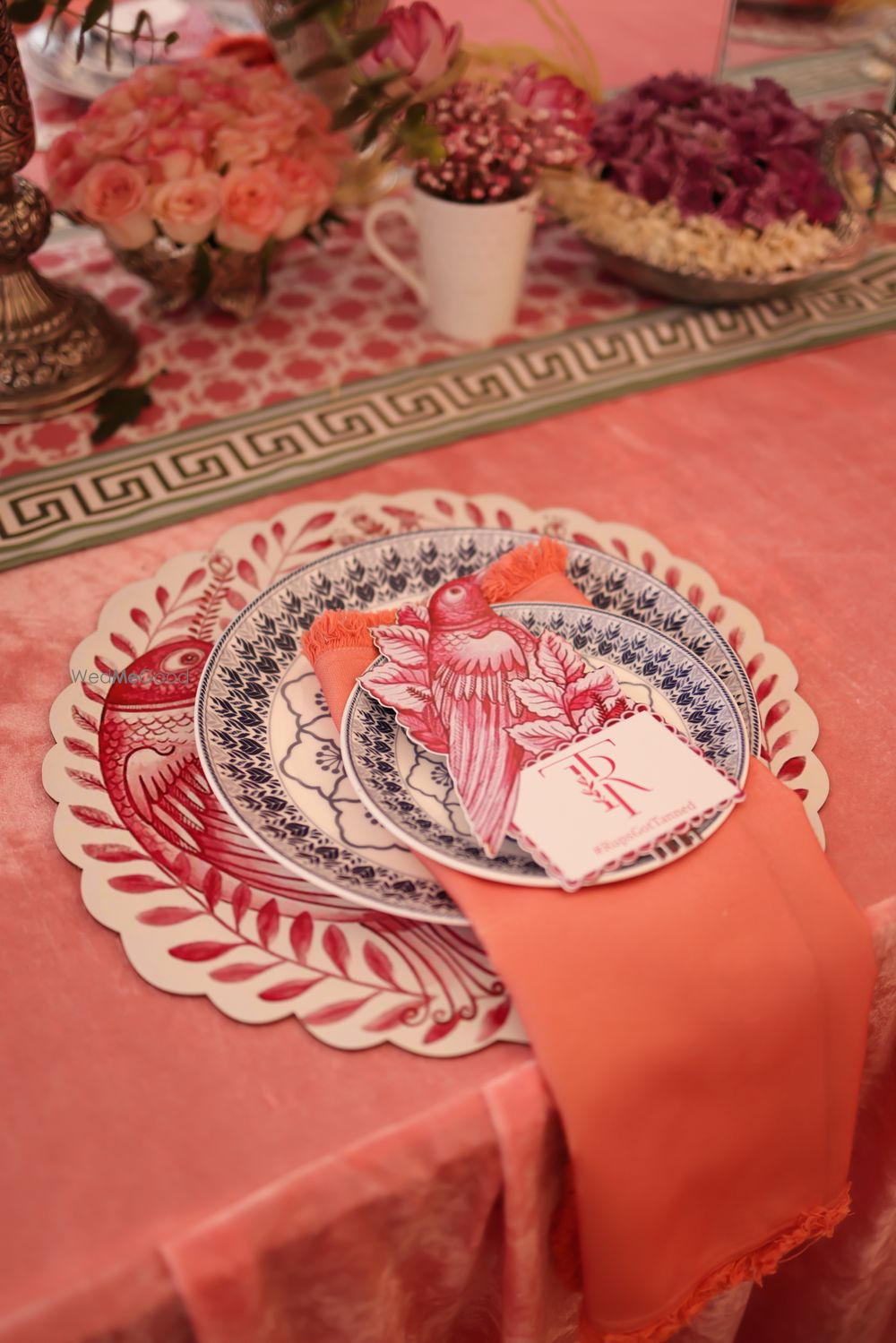 Photo of Lovely dinner table setting idea with printed bird motifs and monogrammed details