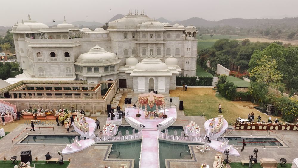Photo of Palace wedding with an open air mandap with floral detailing