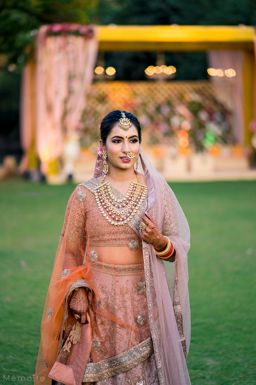 Photo of simple bridal look in offbeat peach lehenga