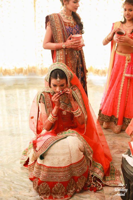 Photo of Red white and green lehenga