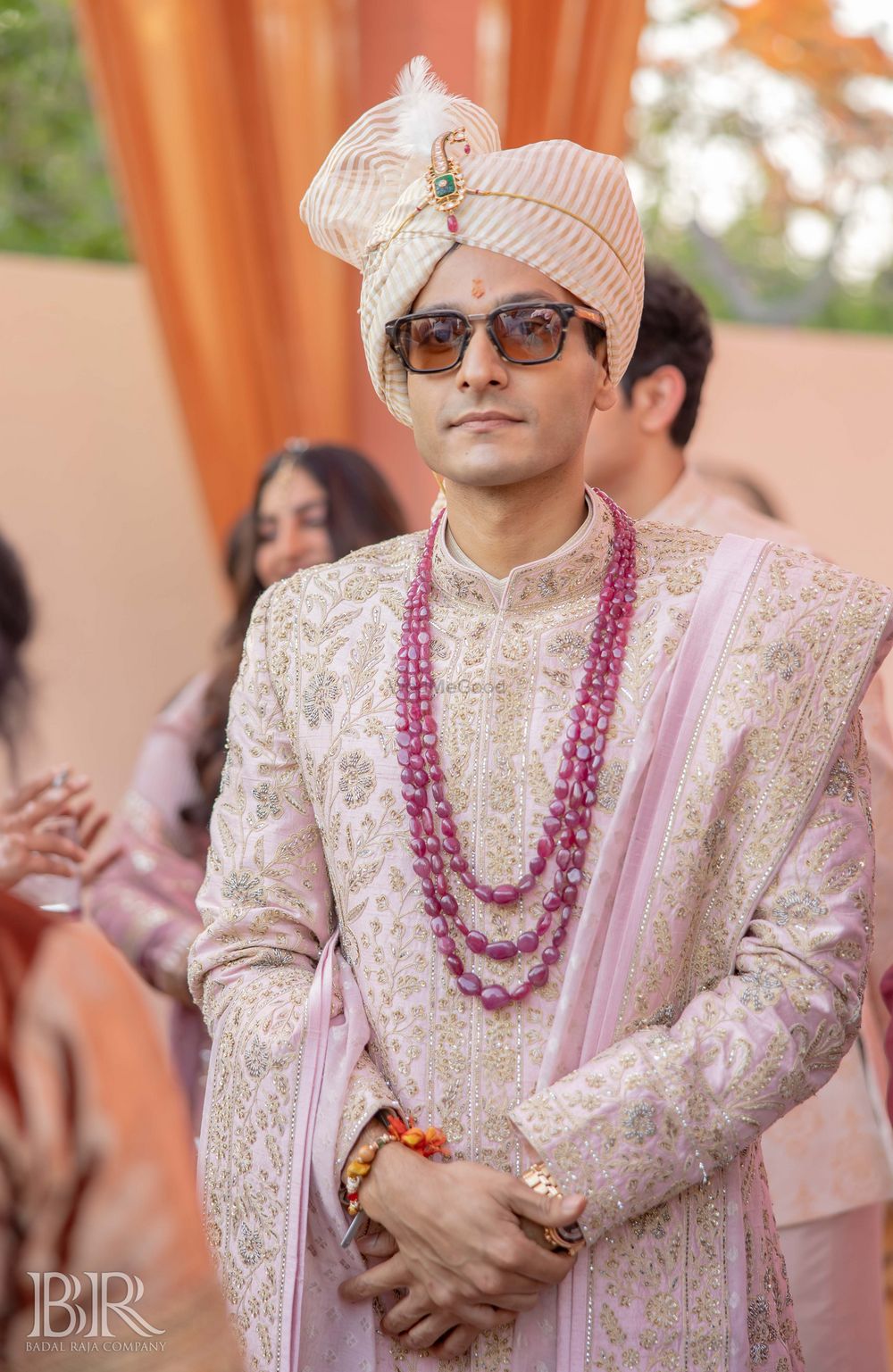 Photo of Heavy embroidered sherwani with ruby necklace for groom.