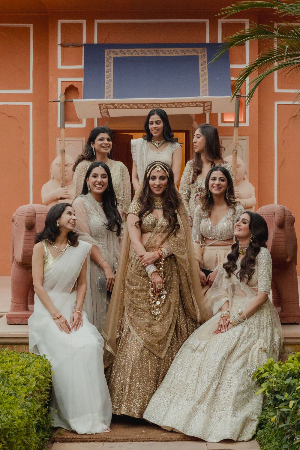Photo of Lovely bridesmaid and bride capture with all bridesmaids co-ordinated in white