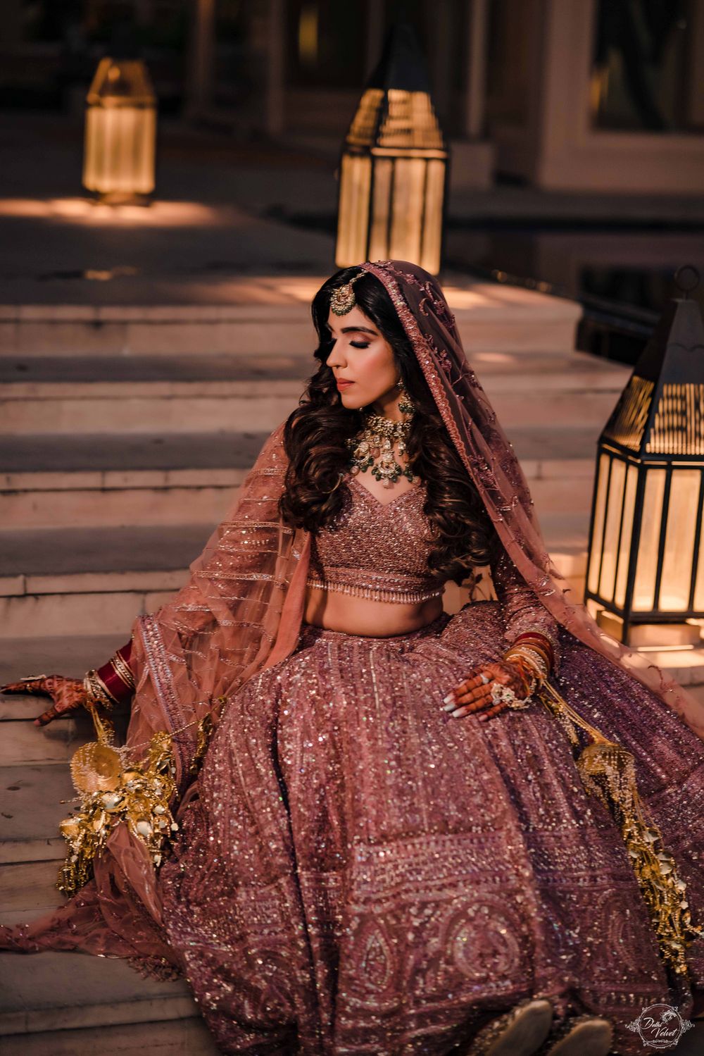 Photo of offbeat bridal look with onion pink lehenga and open hair