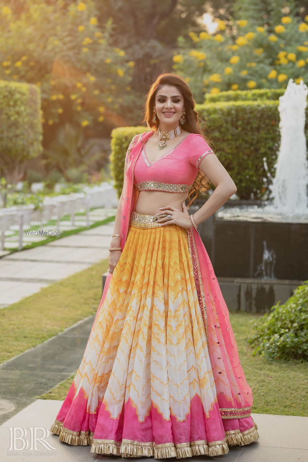 Photo of sister of the bride outfit with pink and yellow combination