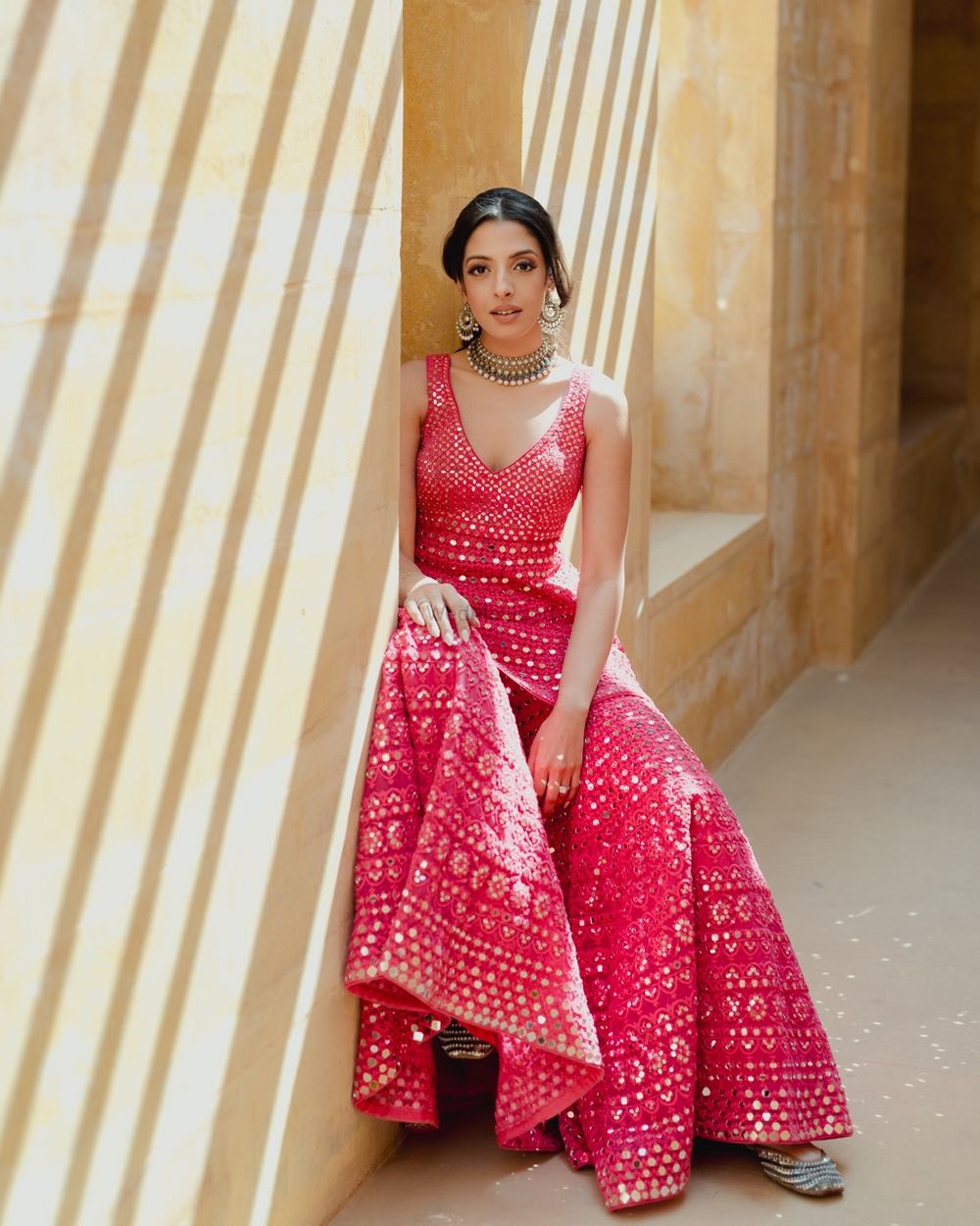 Photo of Pretty bright pink sharara look with mirrorwork detailing