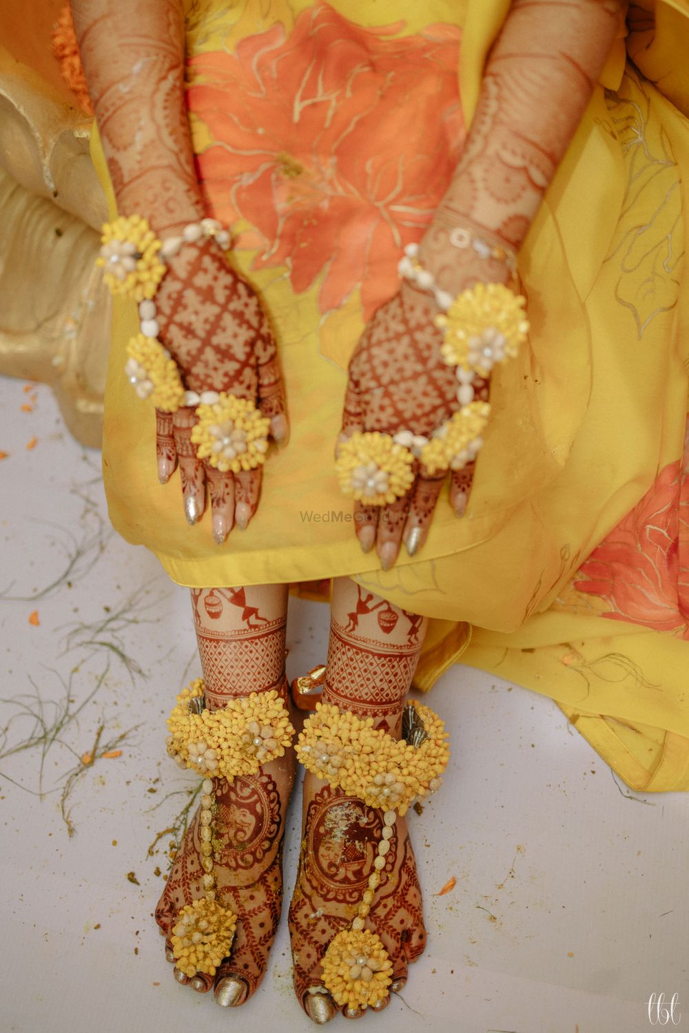 Photo of floral jewellery for haldi with haathphool and anklets