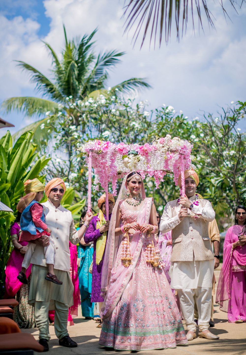 Photo of Bridal entry with a gorgeous pink and white phoolon ki chaadar