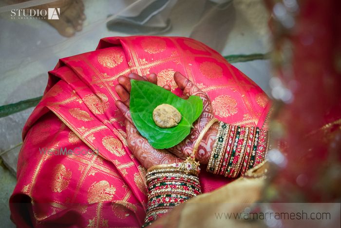 Photo of Coral Pink Kanjivaram Saree with Gold Print