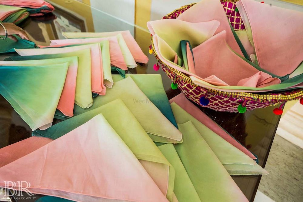 Photo of Pocket squares in pastel colours as favours