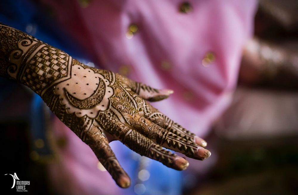 Photo of Unique Bridal Back Hand Mehndi Design