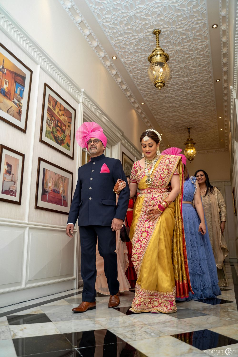 Photo of Bridal entry idea in yellow saree with her father
