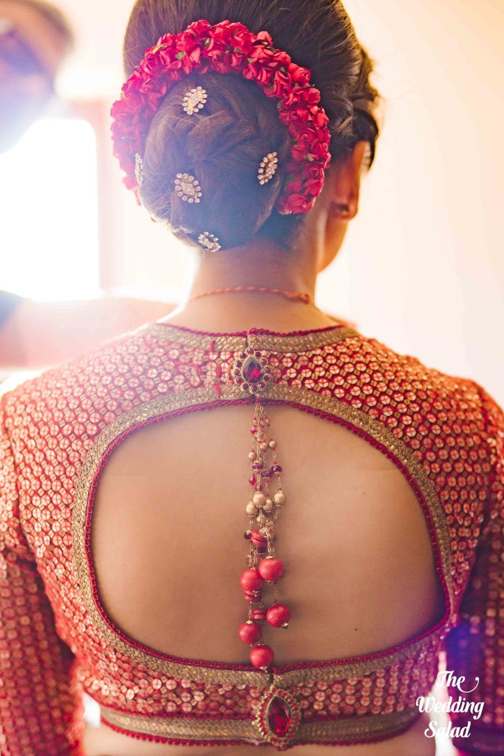 Photo of Bridal back with bun and keyhole style blouse