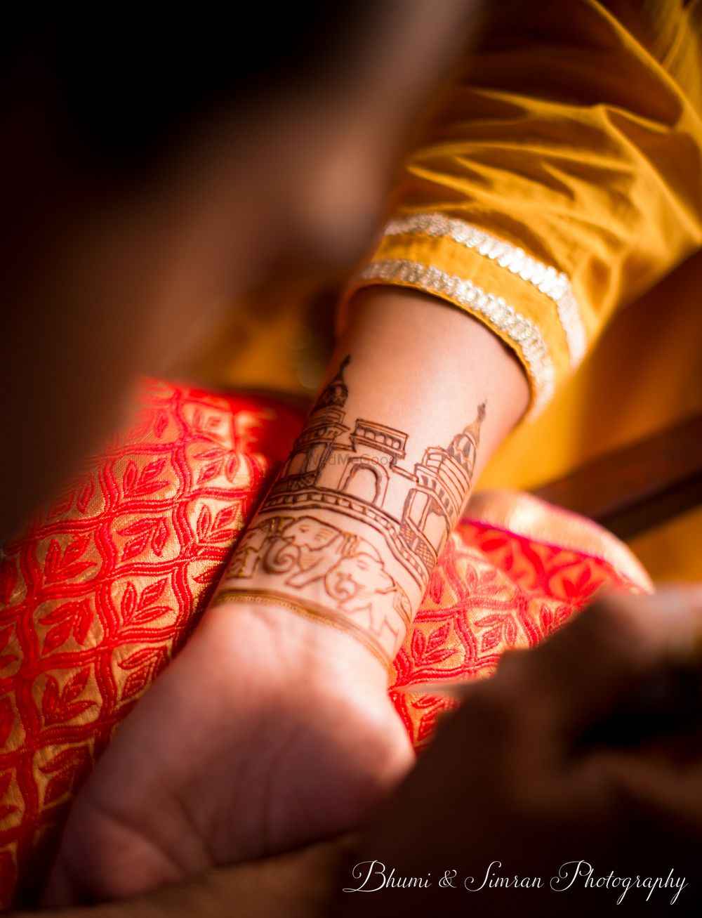 Photo of Personalised bridal mehendi design with elephants