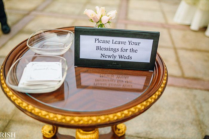 Photo of Guests leave advice and blessings for the couple