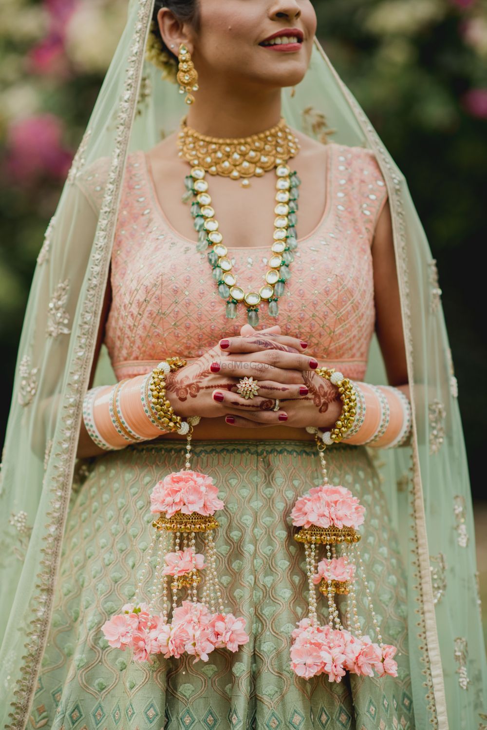Photo of Offbeat bridal hue with peach kaleere and light pink chura