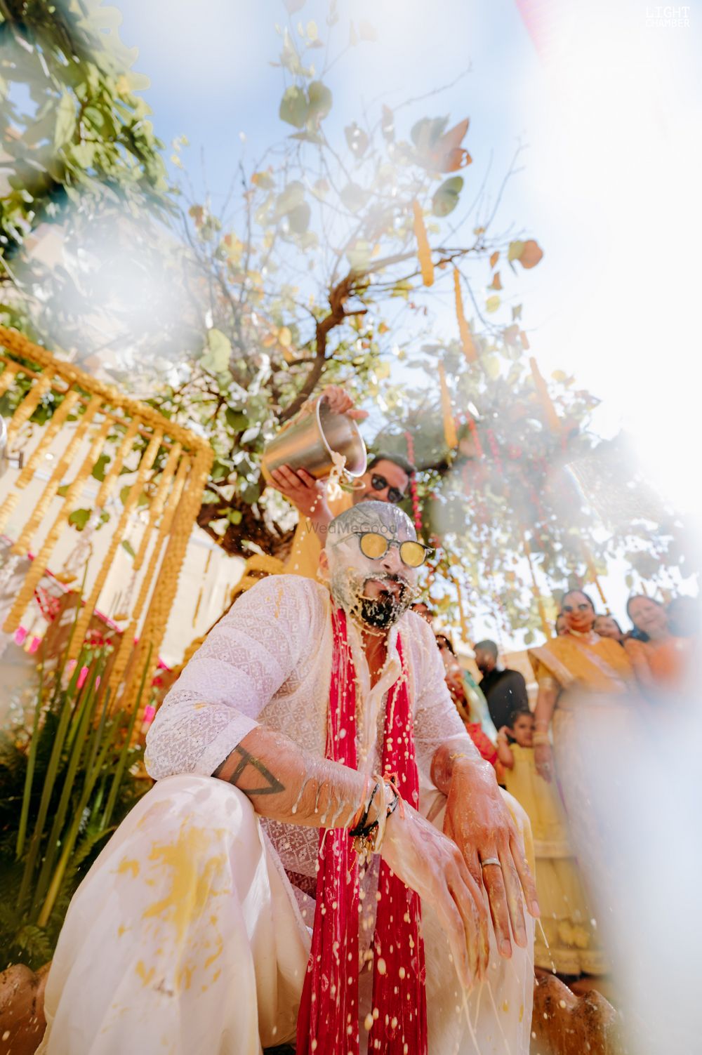Photo of Fun groom haldi photo ideas