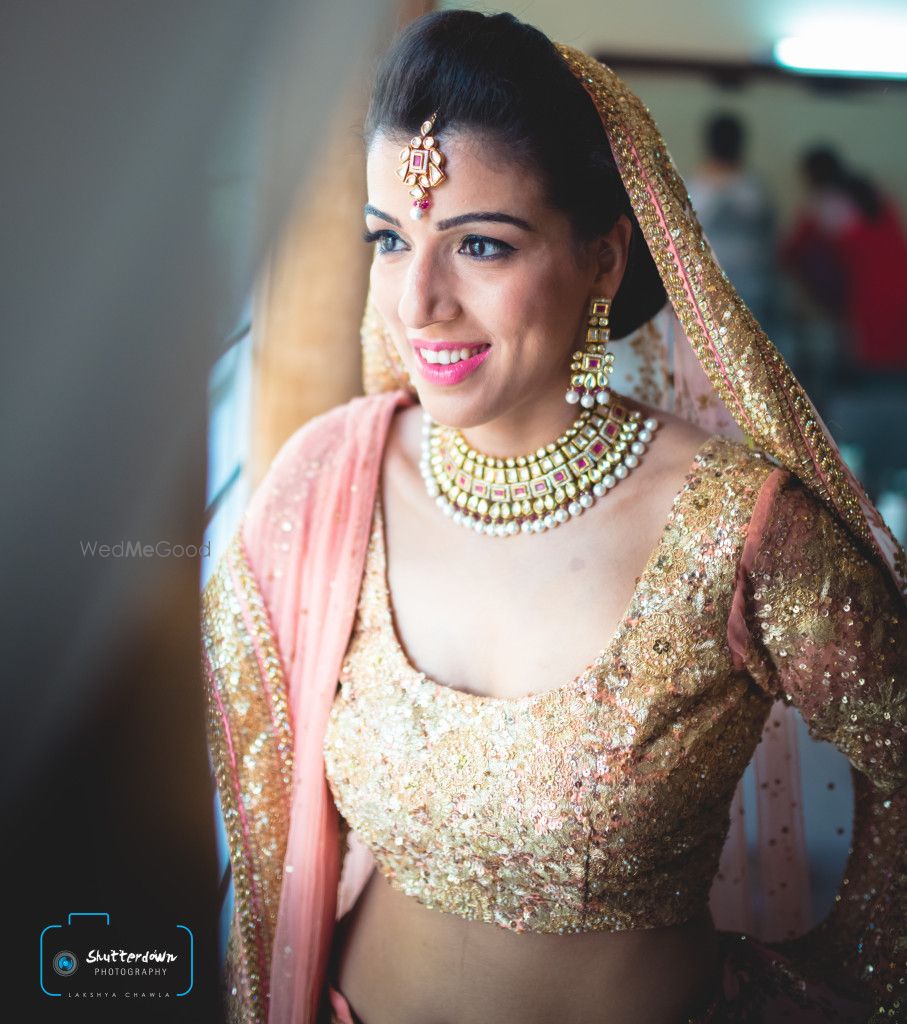 Photo of peach and gold blouse