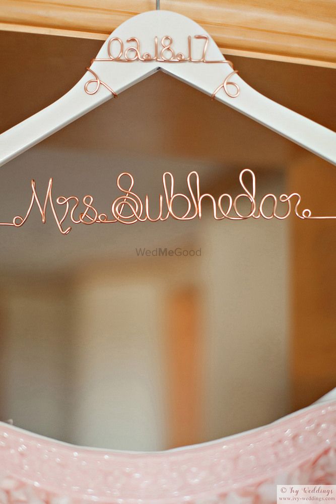 Photo of Personalised bridal hanger with brides new name