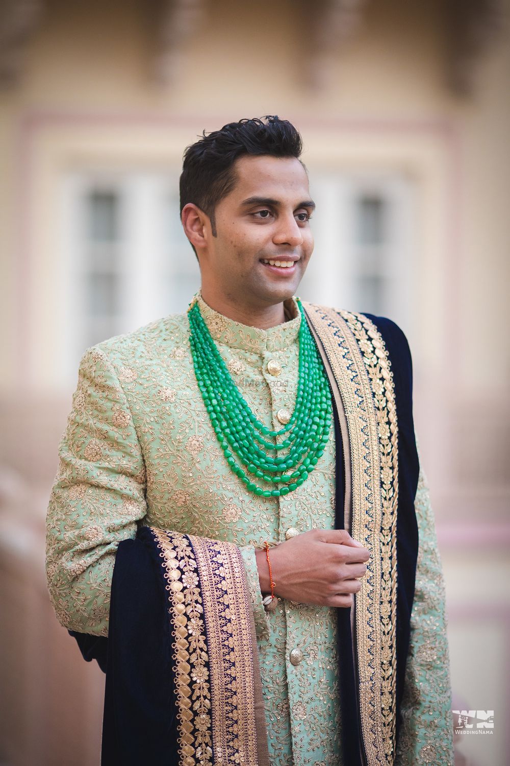 Photo of Groom necklace with green beads and velvet dupatta