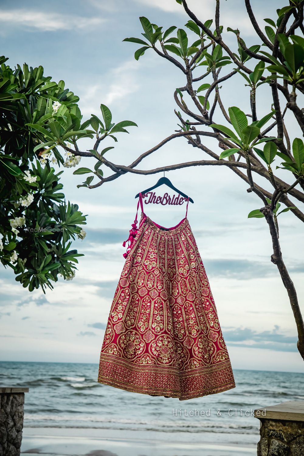 Photo of Red hanging lehenga shot