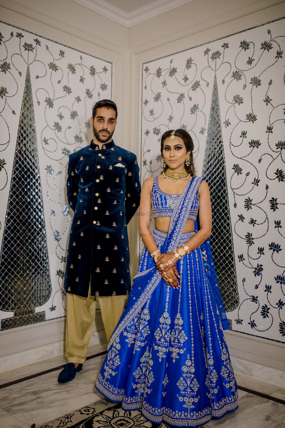 Photo of Couple in coordinated outfits for sangeet