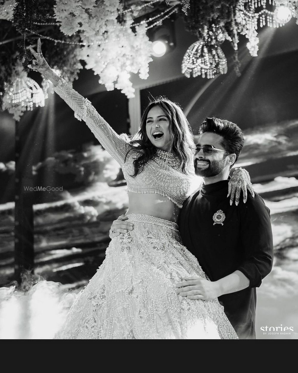 Photo of Fun shot of the couple dancing on the sangeet night