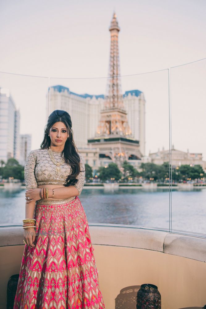 Photo of Fuschia pink and gold lehenga by Anita DOngre