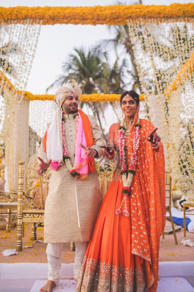 Orange Wedding Photoshoot & Poses Photo jaimala ideas